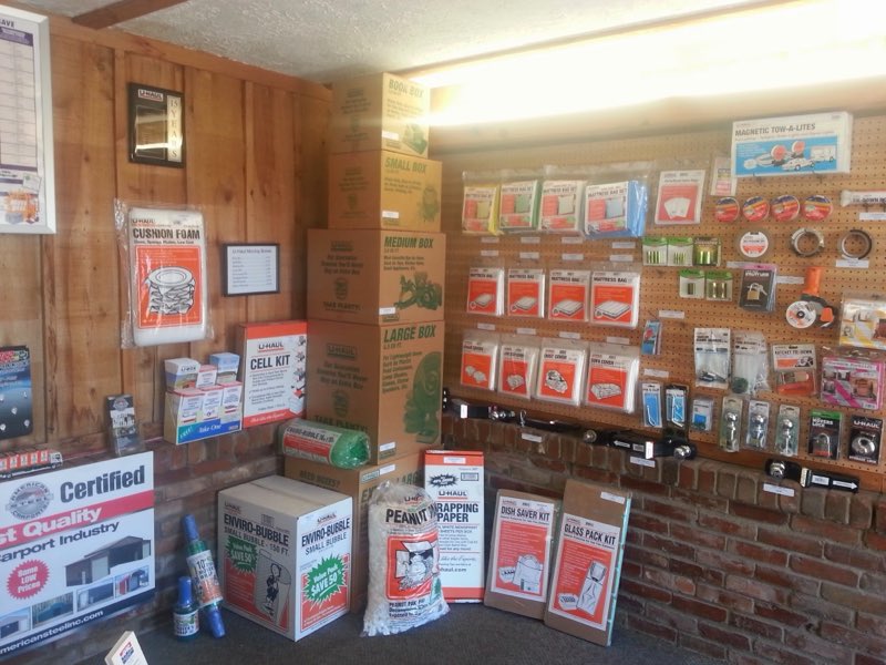 Interior wall of moving boxes, tape, padding and towing accessories